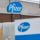 A picture shows the company logo at the US pharmaceutical giant Pfizer plant in Puurs, northeast Belgium, on December 23, 2020.